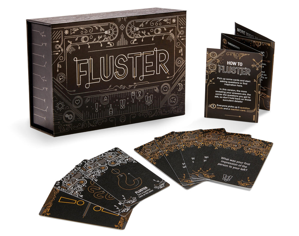 The Fluster box, cards, and rule booklet looking hot.