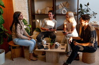 Group of friends plays Fluster in a living room.